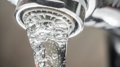 hard water coming out of faucet