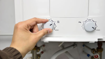 hand on tankless water heater knob